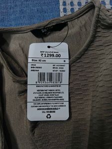 Sleeveless Front Cut-Out Textured Dress