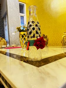 Crystallized designer plastic bottle