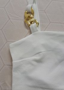 White crop top with golden strap
