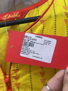 Yellow Printed Kurta And Red Pallazzo