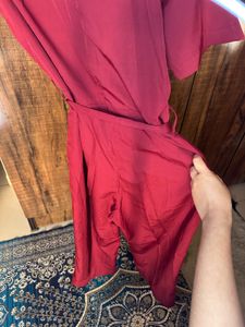 Red belted jumpsuit