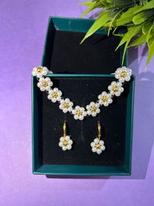 White Floral Necklace And Earrings