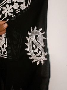 A Short Chikankari Kurti In Black Colour