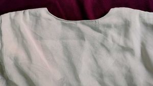 Delicate White Kurti with Embroidered Neckline