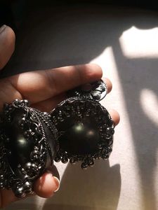 The black and big earring