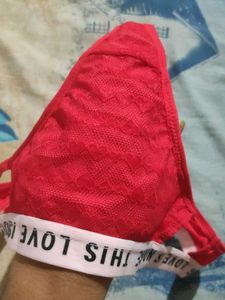 Red &#34;Love is Noise&#34; Thong