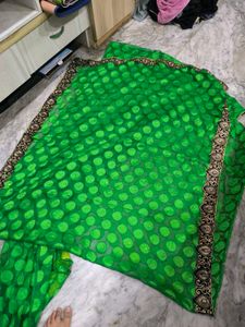 Green Leaf Saree With Yellow Stones.