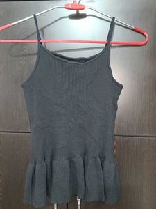 Sleeveless Black Peplum Top