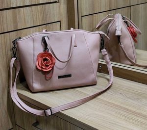 Caprese Peach-Coloured Solid Handheld Bag
