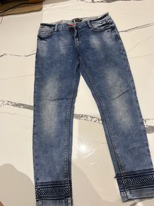Mid Rise Blue Denim Jeans