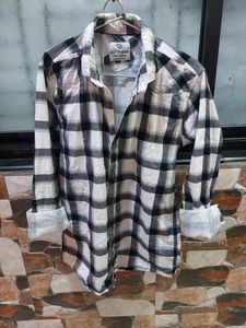 A Black &amp; White Checkered Shirt