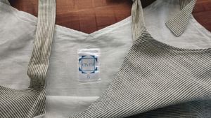 Kuyil-T Grey Peplum top