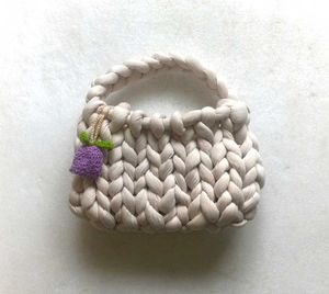 cute handmade crochet bag with charm