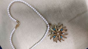 pulse necklace flower design