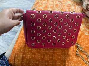 Red Grommet Chain Bag