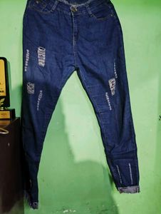 Ripped Blue Denim Jeans
