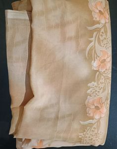 Soft Cream And Peach Floral Saree