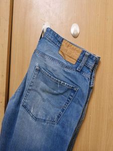 Distressed Denim Jeans