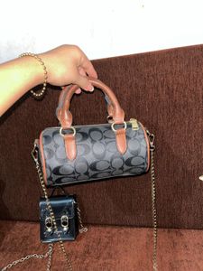 Coach Signature Mini Duffle Bag