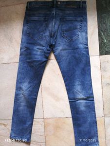 Distressed Denim Jeans