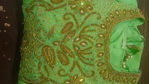 Elegant Green Embroidered Dress with Gold Detailin