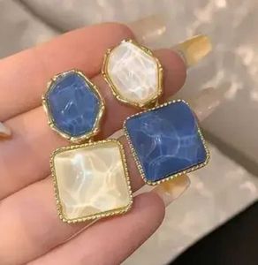 Stylish Blue &amp; White Earrings