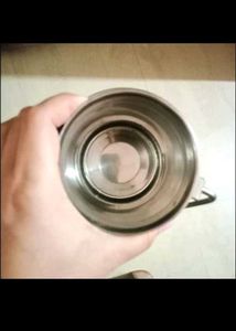 A  Steel Milk Can Or Container
