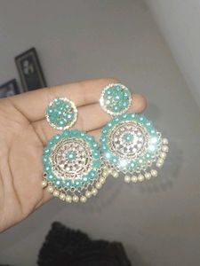 A beautiful earings and mangtika
