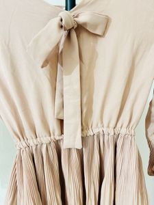 Cute Peach Peplum Top with Bow