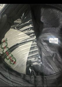 Patterned Shirt and Gucci cap