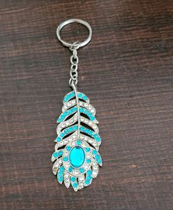 Oh My God Krishna Mor Pankh Metal Keychain Blue Colour