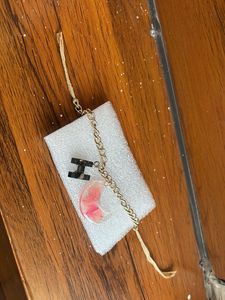 Bracelet with initial letter and real flower