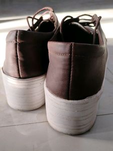 Brown platform shoes