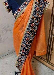 Elegant Orange Embroidered Saree 💕