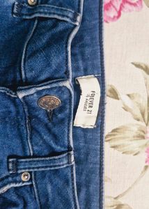 Ripped Knee Jeans
