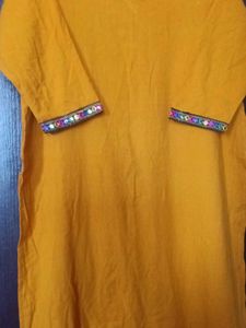 Yellow Kurti with Colorful Trim