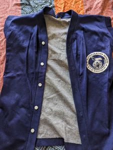 Shrug Type Top Of SRNM Chennai Logo