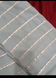 Partywear Grey and Golden saree with blouse