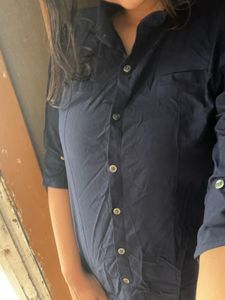 blue shirt that looks fitted on every body type
