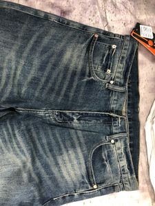 Distressed Wash Denim Jeans
