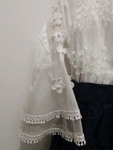 White Peplum Top