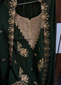 Pakistani mehandi stone work suit