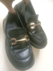 Black Loafers with Gold Detail