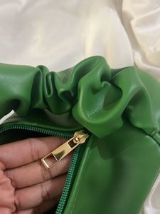 green scrunched hand bag