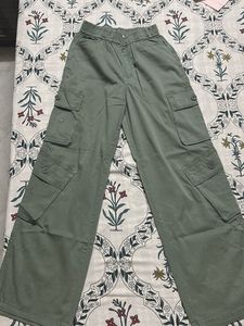 It Is A Olive Green Cargo With Pockets In I