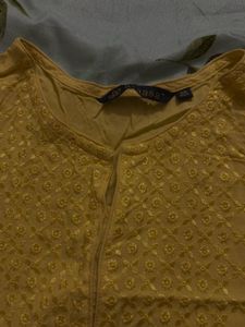 Yellow Kurti with Subtle Detailing