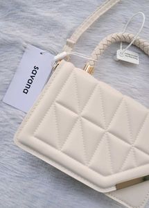 Savana Quilted Sling Bag