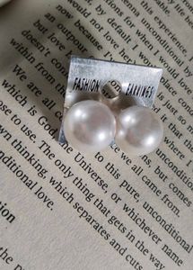 pearl stud earrings.