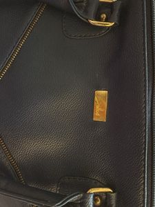 Yelloe V Shaped Zip Blue Hand Held Bag