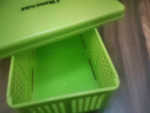 green basket bag with cover